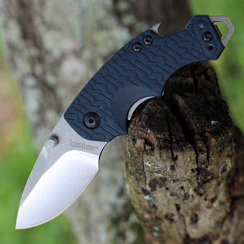 Kershaw Shuffle 8700NBSWWM open view showing the stonewashed blade, navy blue K-Texture handle, and integrated bottle opener.